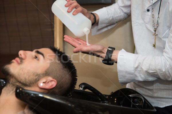 Portrait Of Male Client Getting His Hair Washed Stock photo © Jasminko
