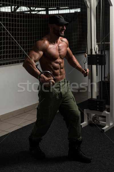 Mature Bodybuilder Is Working On His Chest Stock photo © Jasminko