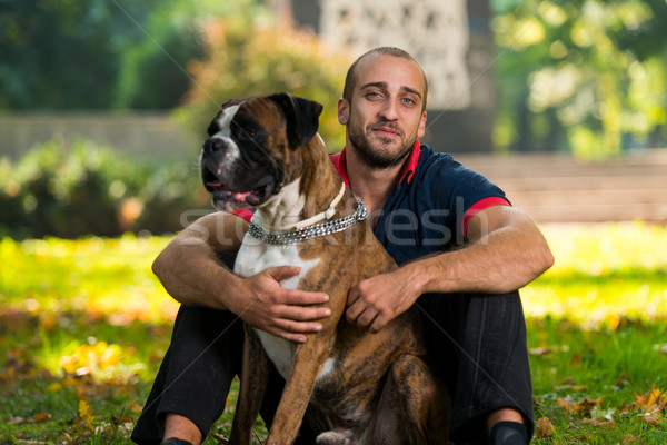 Közelkép fiatalember kutya szeretet erdő kutyák Stock fotó © Jasminko
