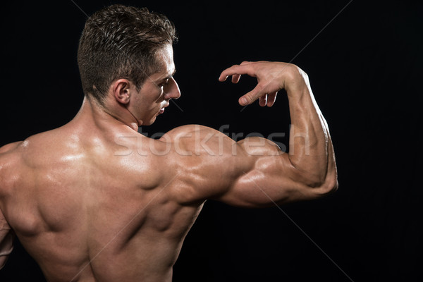 Bodybuilder tonen biceps jonge spieren Stockfoto © Jasminko