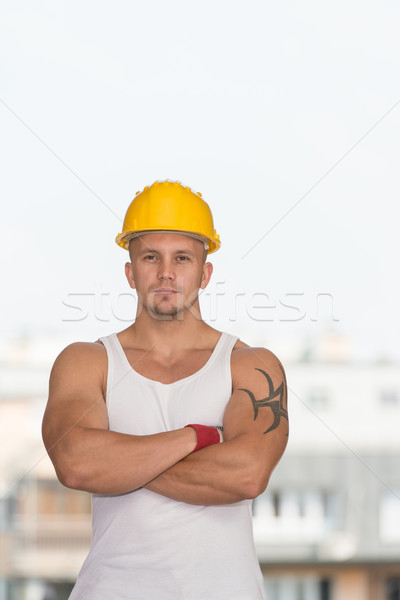 Porträt jungen Arbeitnehmer gut aussehend Ingenieur gelb Stock foto © Jasminko