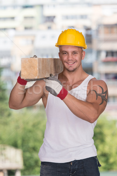 Knappe man hout glimlachend timmerman Stockfoto © Jasminko