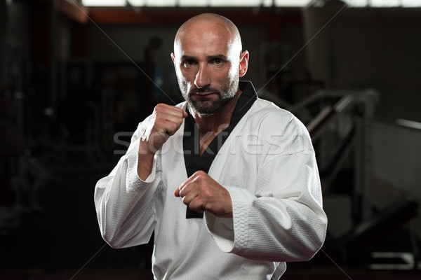 Black Belt Karate Expert With Fight Stance Stock photo © Jasminko