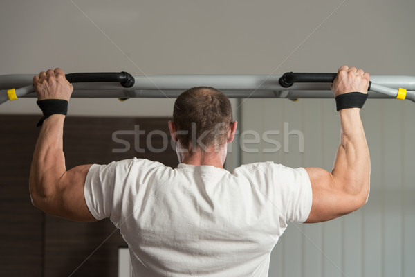 Bodybuilder Doing Pull Ups Best Back Exercises Stock photo © Jasminko