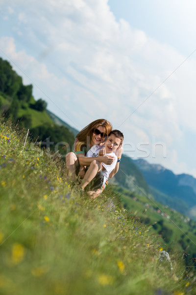 mother with son sitting and spreading love Stock photo © Jasminko