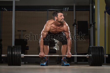 Strong Muscular Men Kneeling On The Floor Stock photo © Jasminko