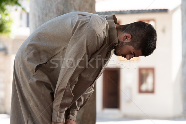 Stock fotó: Fiatal · muszlim · férfi · imádkozik · készít · hagyományos