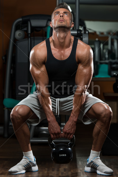 [[stock_photo]]: Homme · bouilloire · cloche · musculaire · exercice · modèle