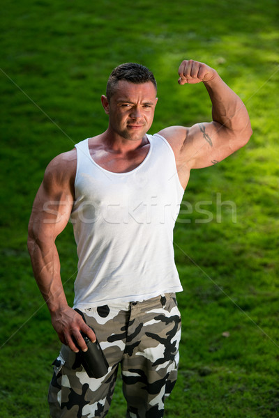 Stock photo: Bodybuilder with Protein Shake