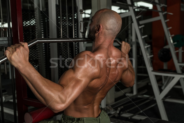 Reifen Bodybuilder schwierig Gewicht Ausübung zurück Stock foto © Jasminko