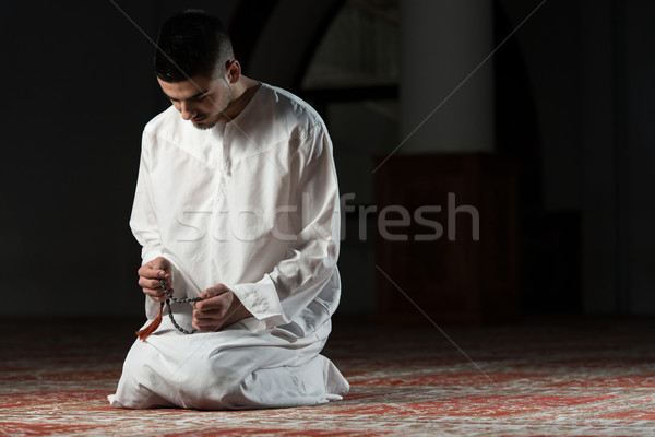 Muslim Praying In Mosque Stock photo © Jasminko