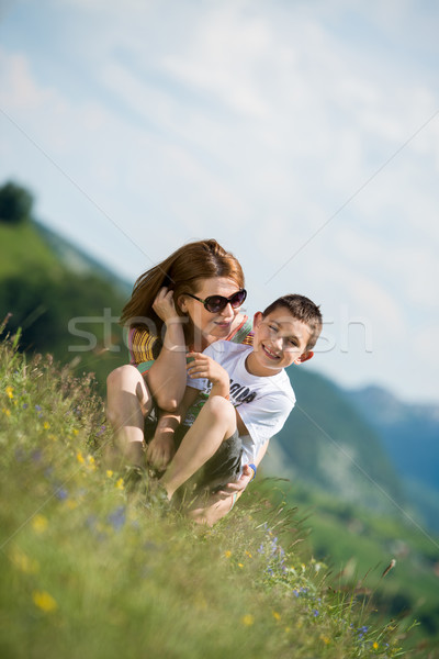 mother with son sitting and spreading love Stock photo © Jasminko