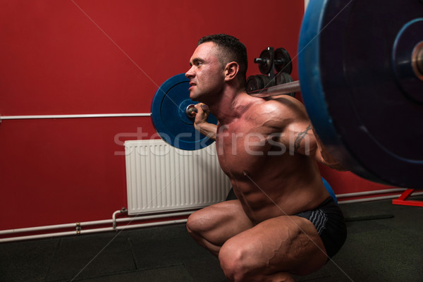 Barra con pesas hombre deporte gimnasio hombres ejercicio Foto stock © Jasminko