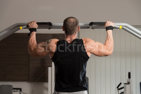 Bodybuilder Doing Pull Ups Best Back Exercises Stock photo © Jasminko