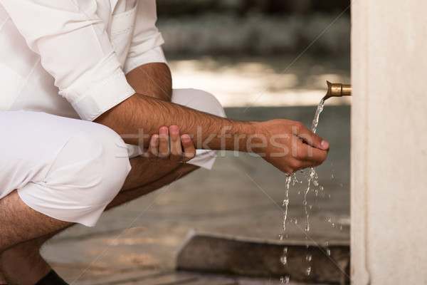 Islamic Religious Rite Ceremony Of Ablution Hand Washing Stock photo © Jasminko