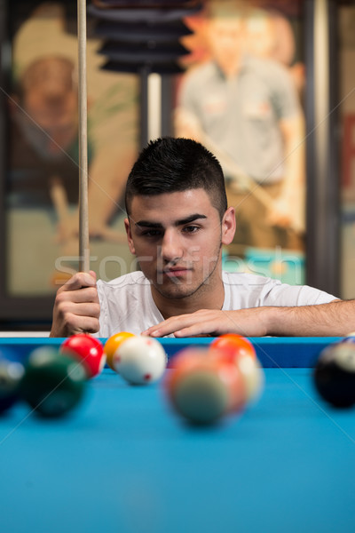 Stock photo: Portrait Of A Young Man Concentration On Ball