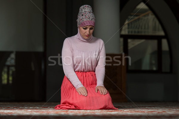 Muslim Woman Praying In Mosque Stock photo © Jasminko