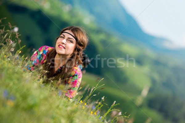 beautiful woman lying on the grass Stock photo © Jasminko