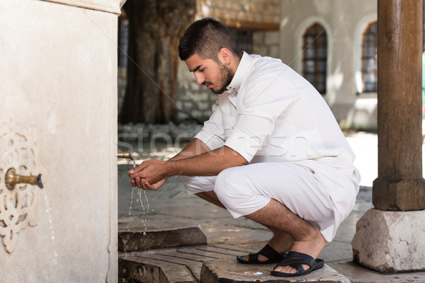 Islamic Religious Rite Ceremony Of Ablution Hand Washing Stock photo © Jasminko
