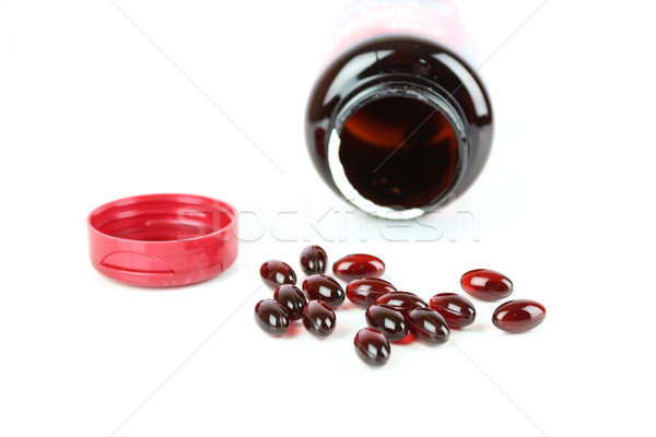 藥物 丸 紅色 凝膠 膠囊 孤立 商業照片 © javiercorrea15