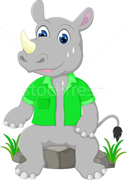 Cute rhino cartoon seduta sudorazione pietra Foto d'archivio © jawa123