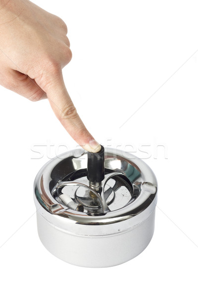 Scrumiera una ţigară mână metalic alb Imagine de stoc © jaycriss