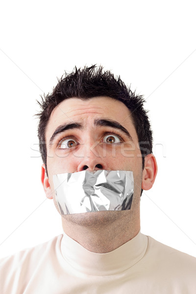 Young man having gray duct tape on his mouth Stock photo © jaycriss
