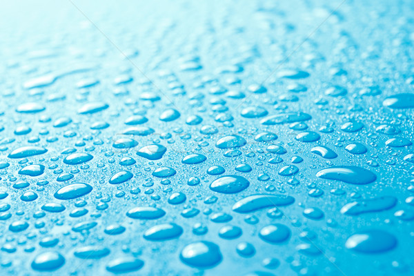 Close-up of fresh water drops on blue surface Stock photo © jaycriss