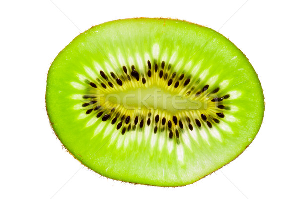 Vibrant slice of kiwi fruit Stock photo © jaykayl