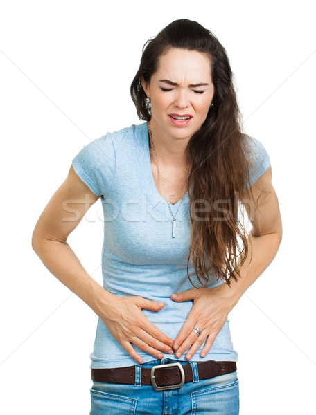 Woman with tummy pain and cramps Stock photo © jaykayl