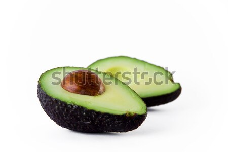 Aguacate verde maduro corte mitad tropicales Foto stock © jaykayl