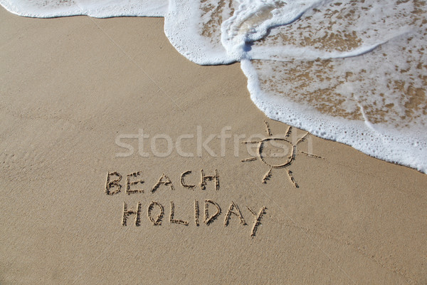Scritto sabbia sole simbolo onda Foto d'archivio © jeayesy