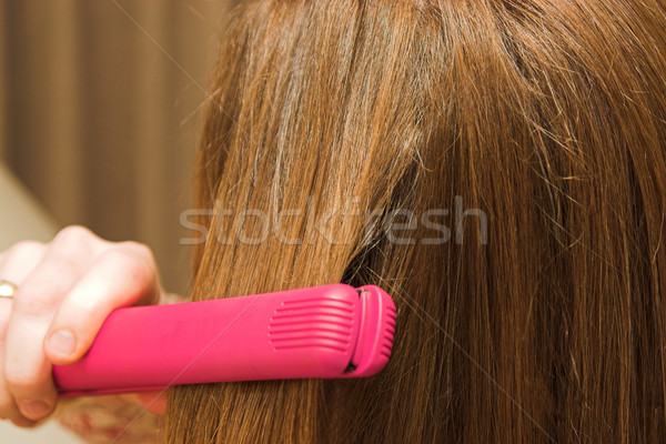 Hair straightening Stock photo © jeayesy