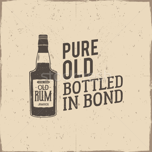 Vintage handcrafted label, emblem with old rum bottle and vector slogan - pure old bottled in bond.  Stock photo © JeksonGraphics