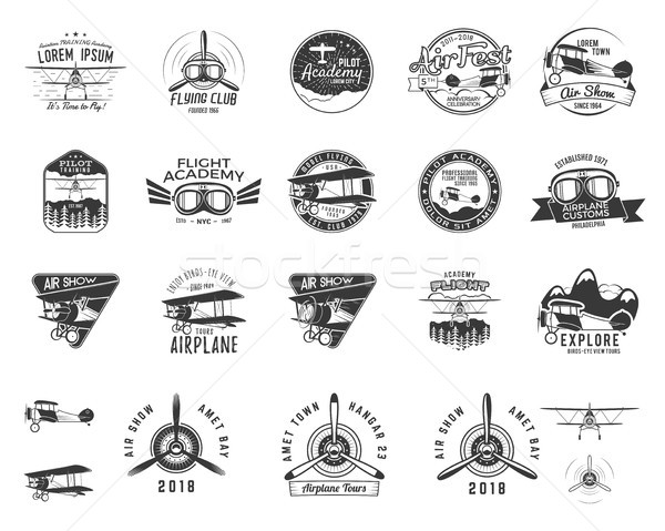 Vintage hand drawn old fly stamps. Travel or business airplane tour emblems. Biplane academy labels. Stock photo © JeksonGraphics