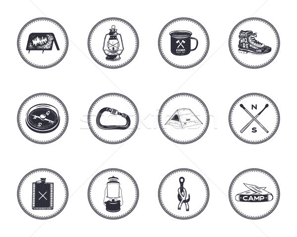 Set of 12 camping silhouette icons and symbols. Hiking equipment elements - tent, boot, lantern, com Stock photo © JeksonGraphics