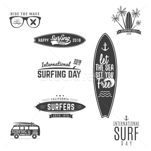 Vintage Surfing Graphics and Emblems for web design or print. Surfer logo templates. Surfing Graphic Stock photo © JeksonGraphics
