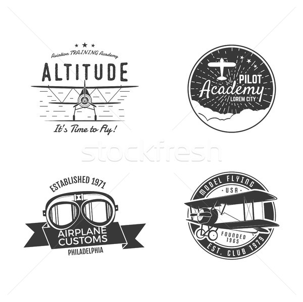 Stock photo: Vintage hand drawn old fly stamps. Travel or business airplane tour emblems. Airplane logo designs. 