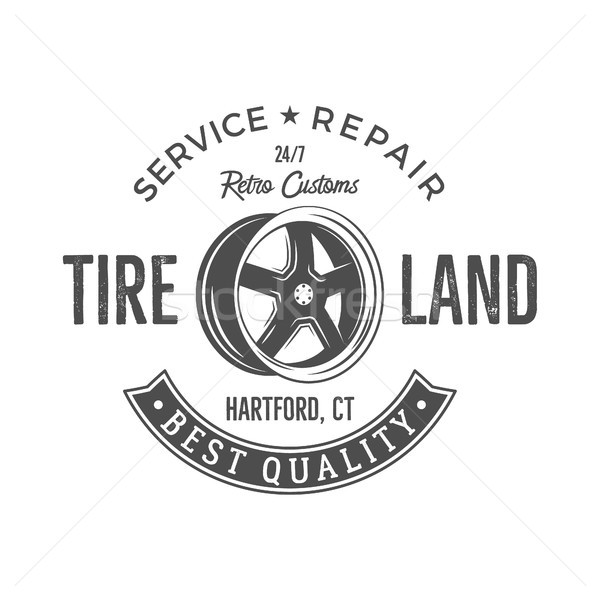 Vintage label design. Tire service emblem in monochrome retro style with old wheel and typography el Stock photo © JeksonGraphics