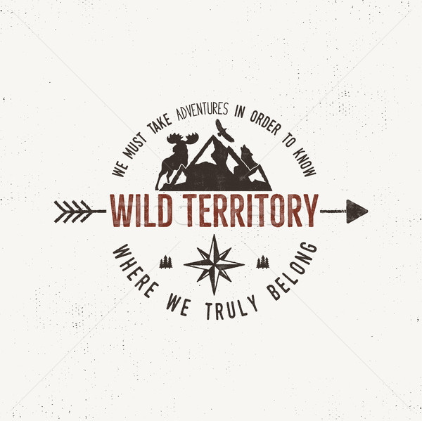 Vintage wild emblem. Retro illustration of wilderness . Typography and rough style. Vector  logo or  Stock photo © JeksonGraphics