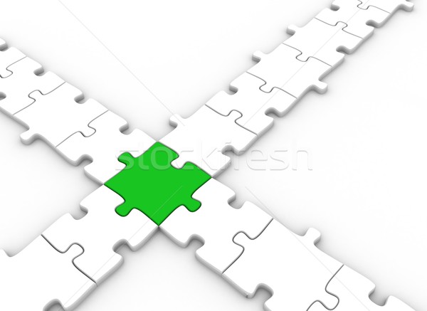 Green puzzle piece  Stock photo © jezper