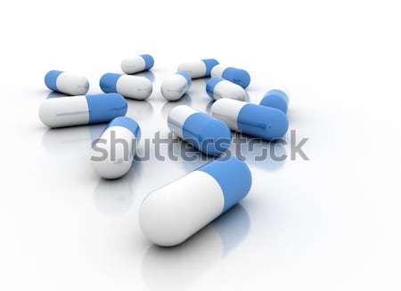 Pills on white background  Stock photo © jezper