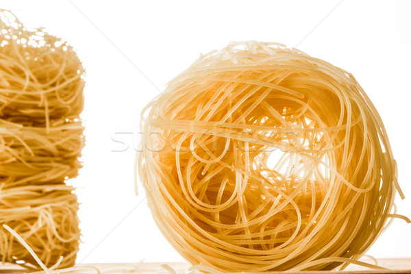 Rollen Engel Haar Spaghetti Rolle weiß Stock foto © JFJacobsz
