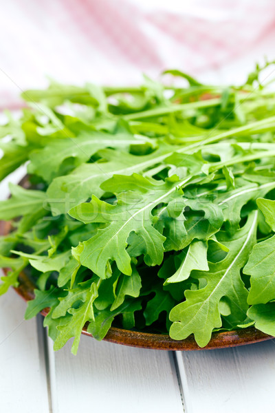 fresh arugula leaves on plate Stock photo © jirkaejc