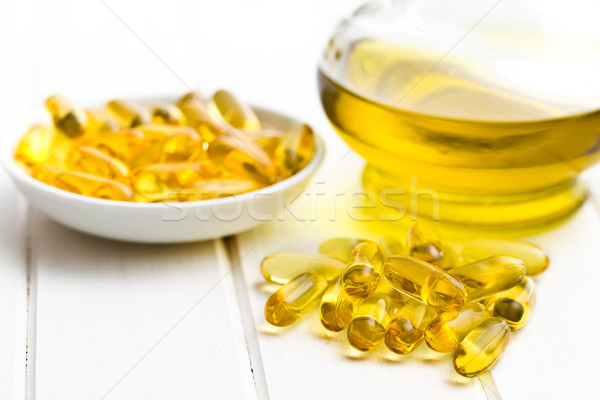 Cod liver oil. Gel capsules Stock photo © jirkaejc