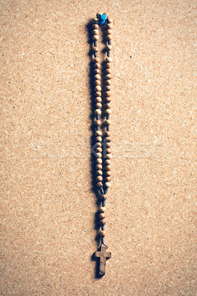 Rosario perline bacheca di sughero legno cross pregare Foto d'archivio © jirkaejc