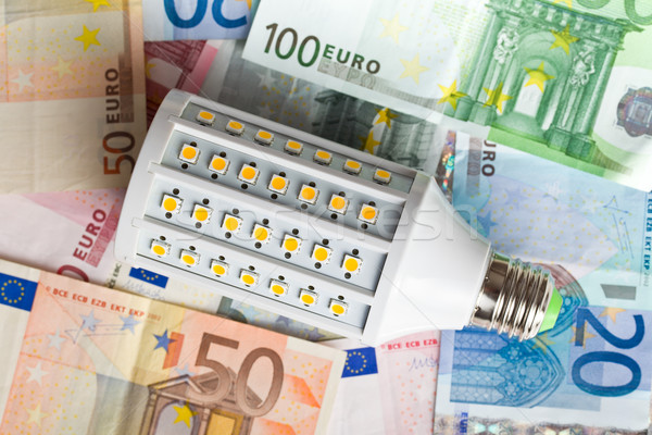 LED lightbulb with euro money Stock photo © jirkaejc