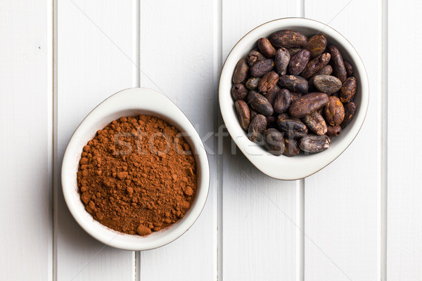 cocoa beans and cocoa powder in bowls Stock photo © jirkaejc