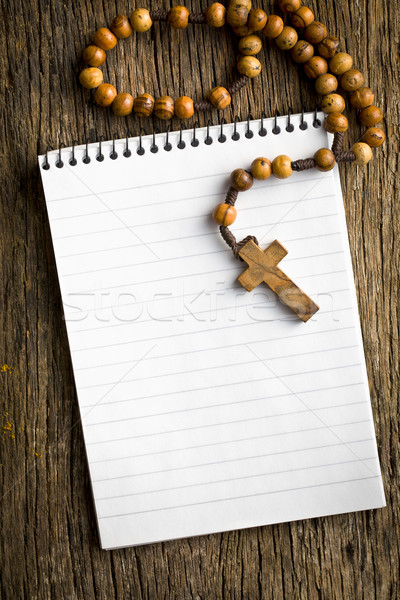 rosary beads and blank notebook Stock photo © jirkaejc