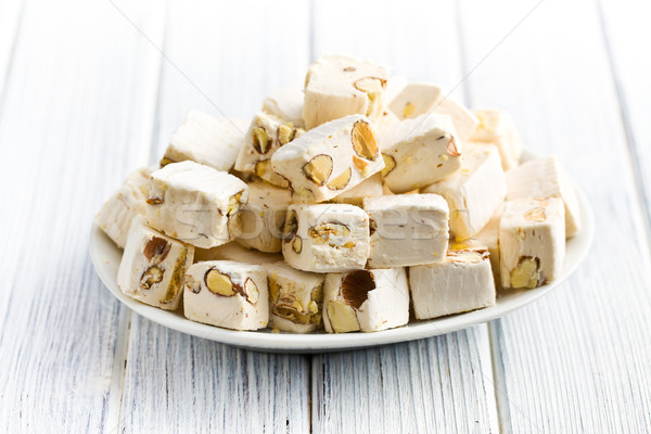 Stock photo:  white nougat with almonds 